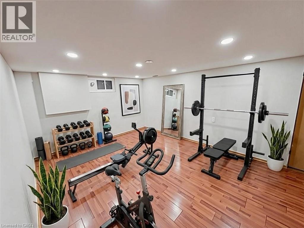 A well-equipped home gym with a variety of exercise equipment.