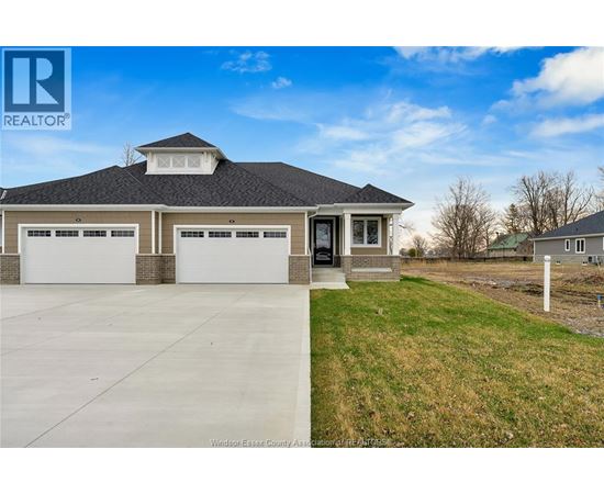 A house with a realtor logo in the corner.