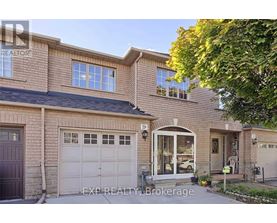 A house with a brown garage door is for sale.