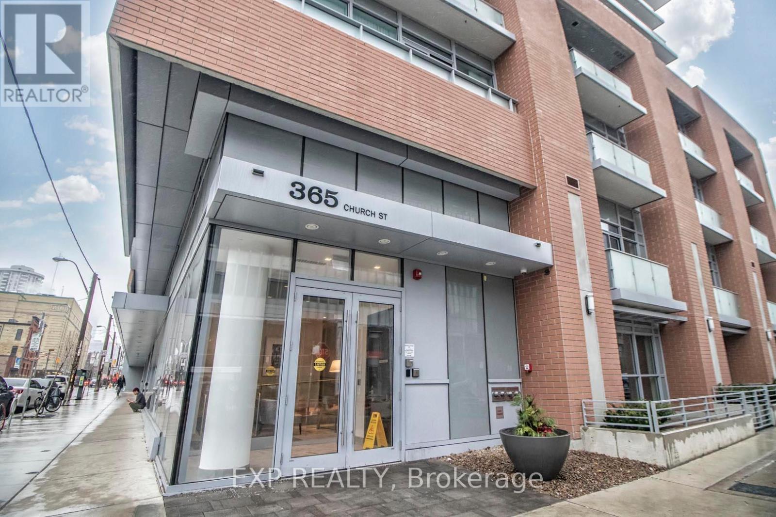 The front of a building with the number 365 and the words Church Street on it.