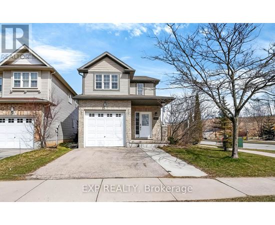 A two-story house with a garage is for sale.