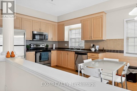 A kitchen with wooden cabinets and a white countertop.