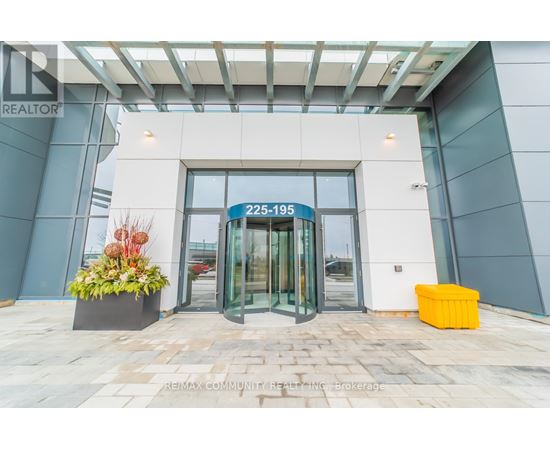 The entrance to a building with a glass door and a sign that reads "225-195".