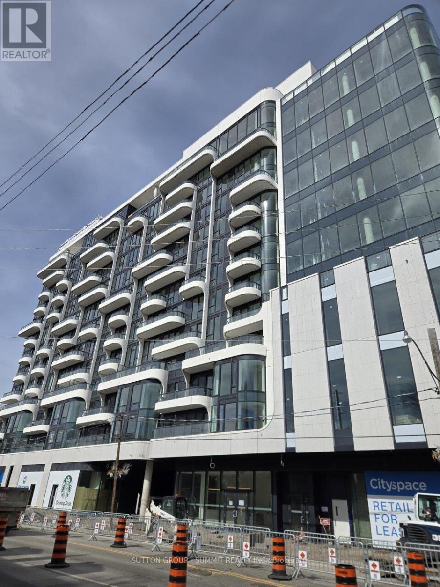 A modern building with a glass facade and a sign that says "Cityspace".