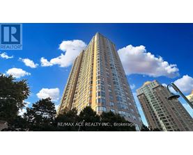 A tall building with the RE/MAX ACE REALTY INC. logo on it.