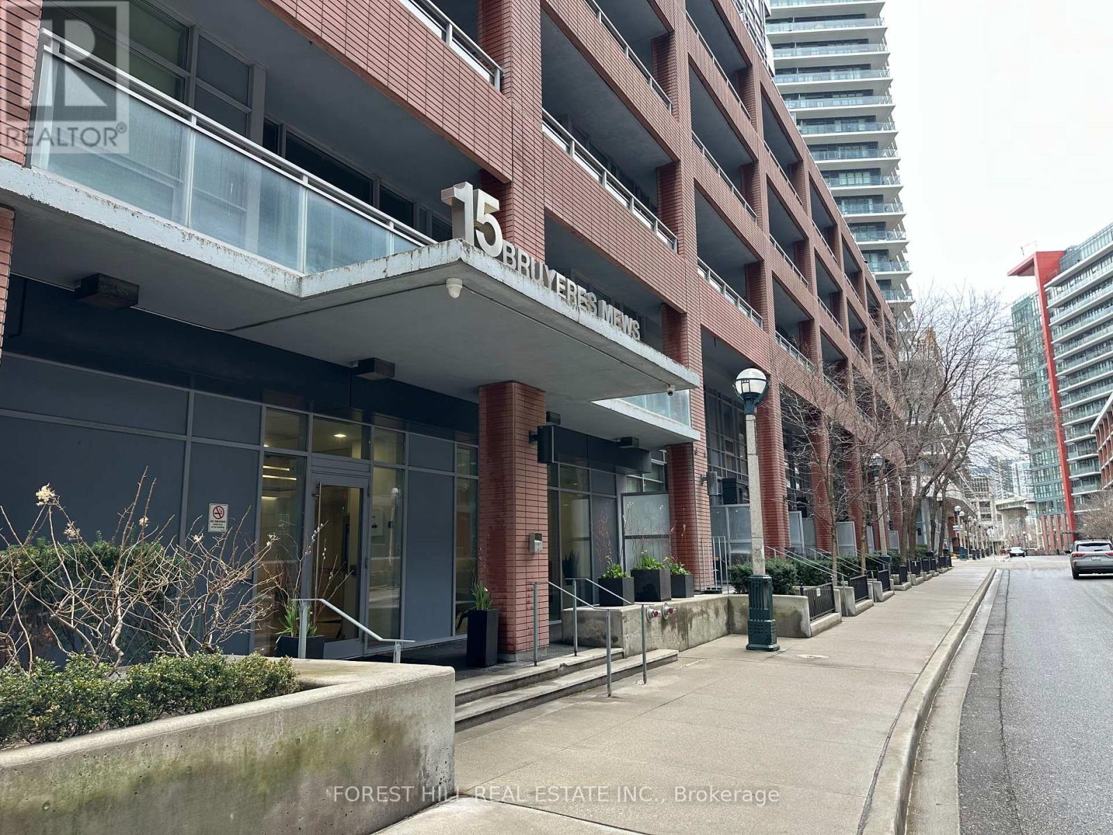A street view of a building with the number 15 on it.