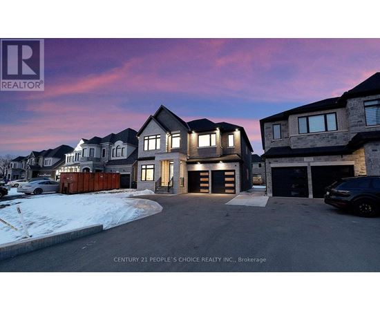 A real estate company's promotional image featuring a modern house with a driveway and garage.