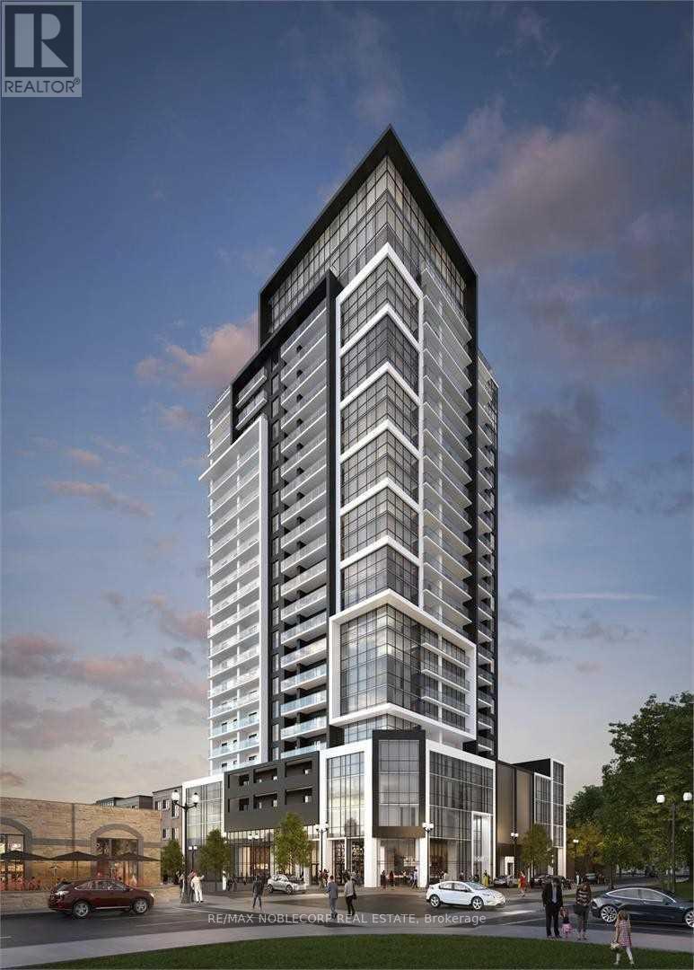 A tall, modern building with a glass facade is depicted in the image.