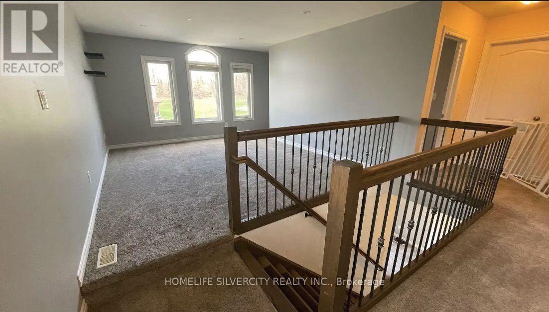 A real estate company's photo of an empty house interior.