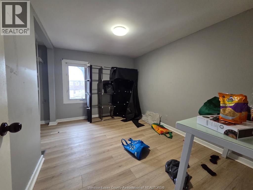 A room with a REALTOR® sign on the door.