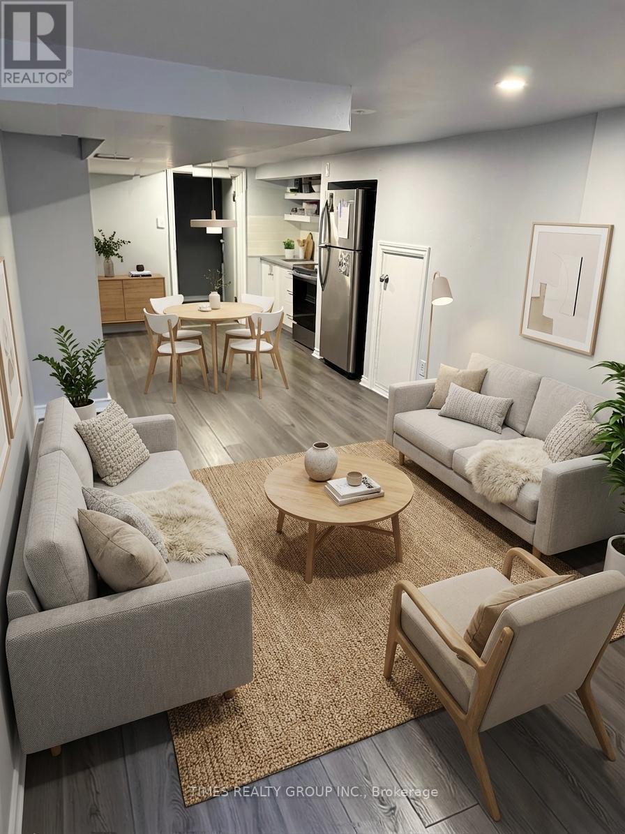 A living room with a grey couch, a wooden coffee table, and a white sofa.