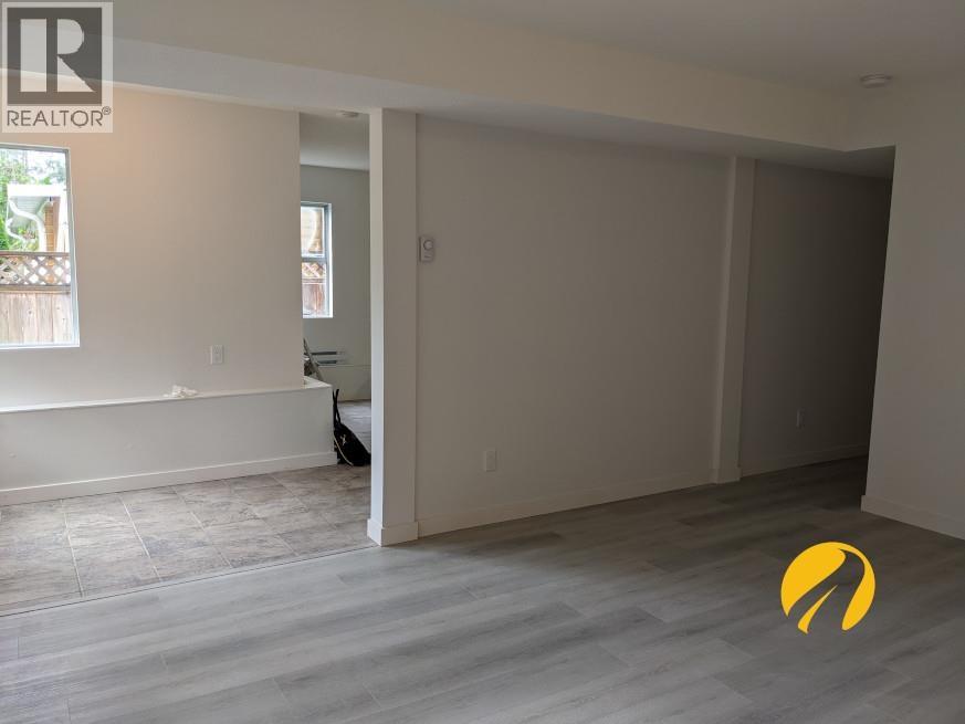 A room with a REALTOR sign on the wall.