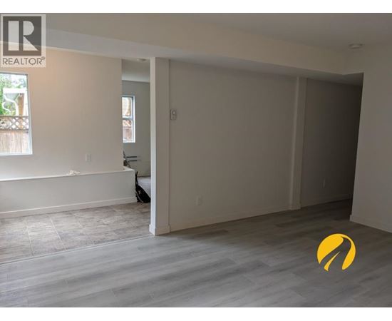 A room with a REALTOR sign on the wall.