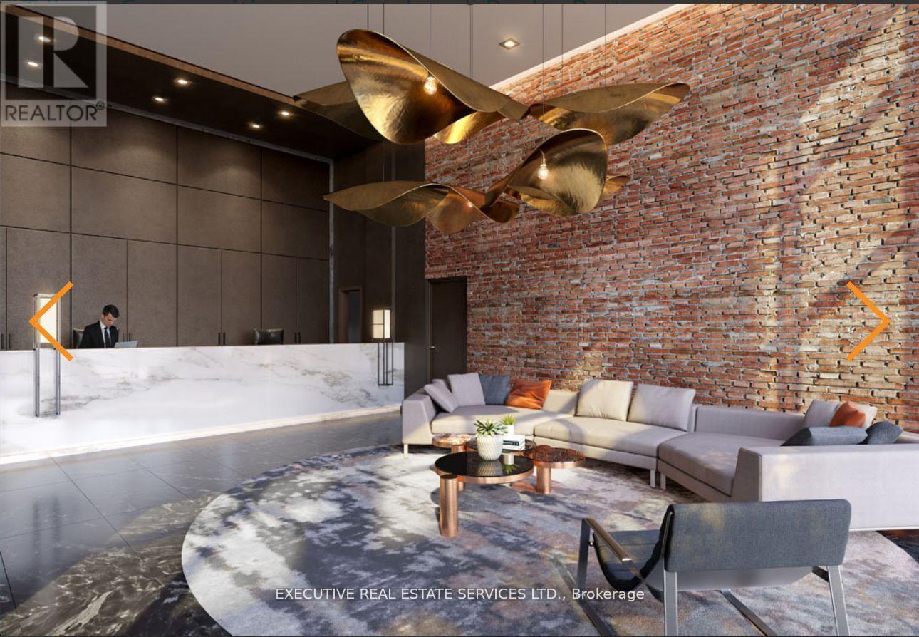 A modern living room with a brick wall and a person standing in the background.