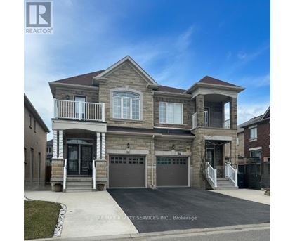 A two-story house with a garage is for sale.