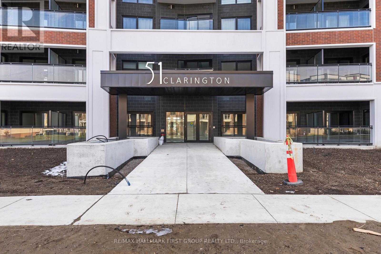 The front of a building with the name 51 Clarington on it.