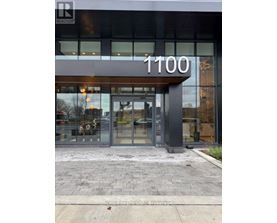 The front of a building with the number 1100 on it.