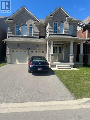 A house with a car parked in front of it.