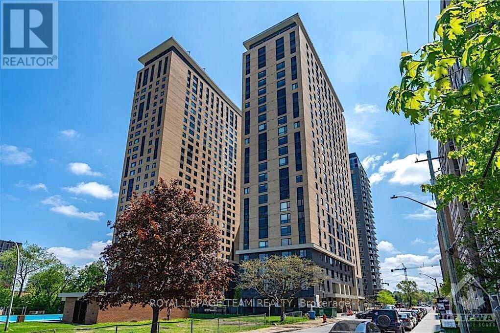 Two tall buildings are seen in the image.