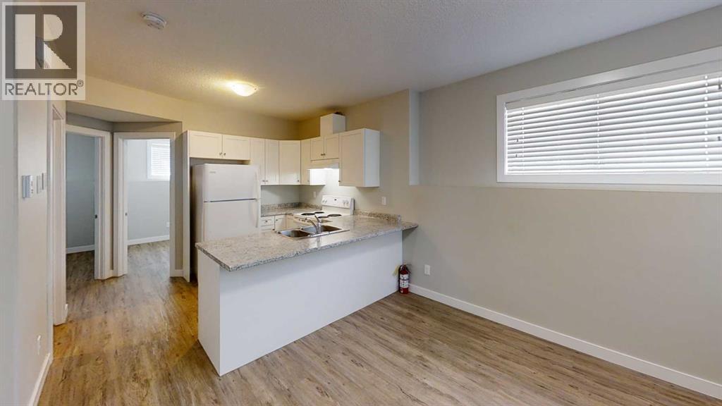 A realtor logo is on the top left corner of the image.