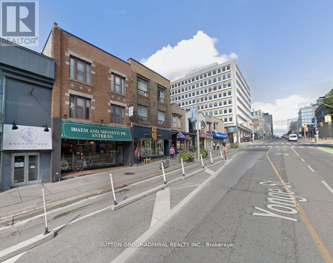 A street view with a sign that says "Knights" on the road.
