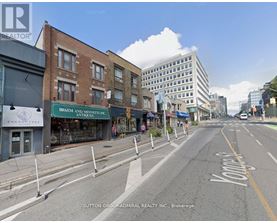 A street view with a sign that says "Knights" on the road.