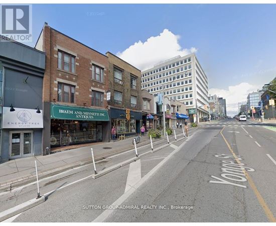 A street view with a sign that says "Knights" on the road.