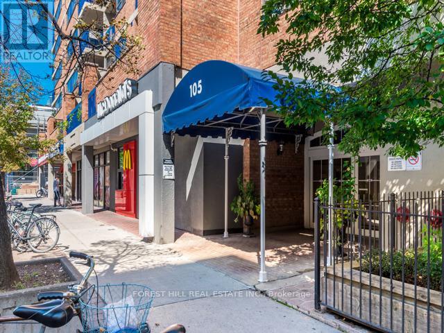 A blue awning with the number 105 on it is on the front of a building.