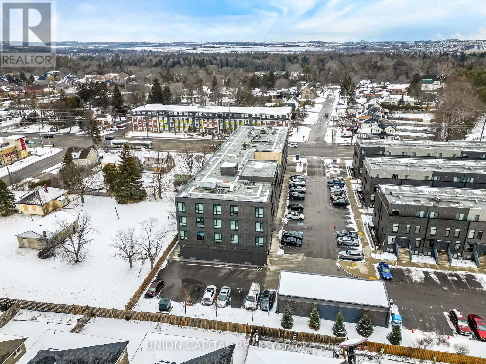 A snowy landscape with a building in the center and a sign that says "Union Capital".