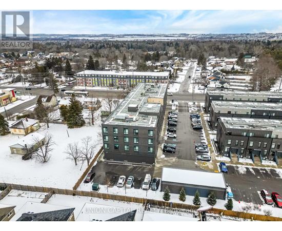 A snowy landscape with a building in the center and a sign that says "Union Capital".