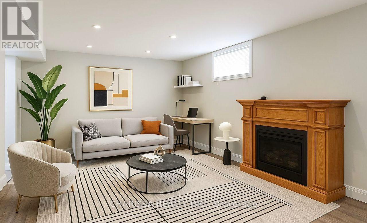 A living room with a fireplace and a couch.
