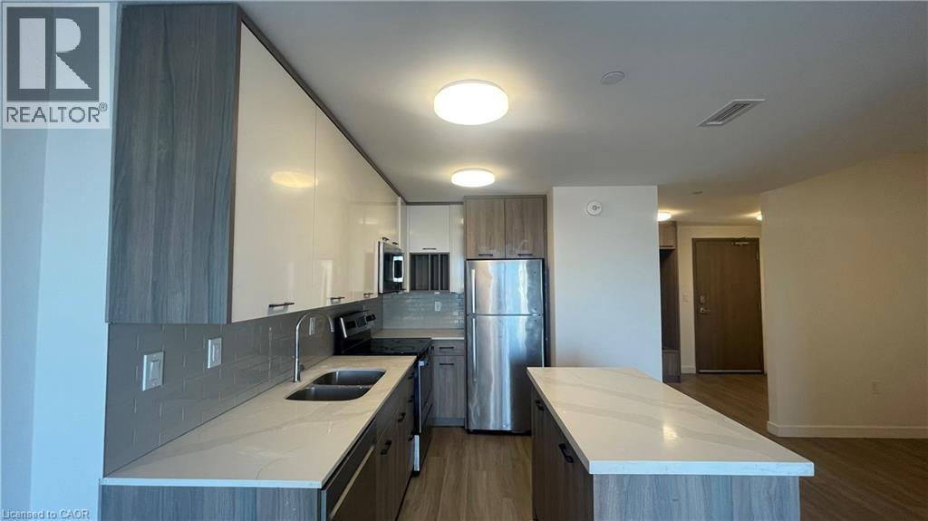 A modern kitchen with a large island in the middle.