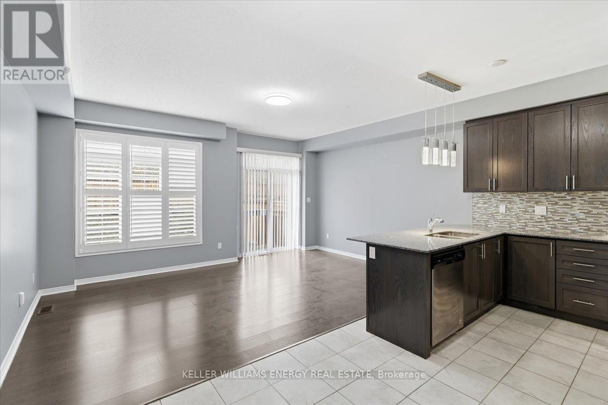 A kitchen with a counter top and cabinets.