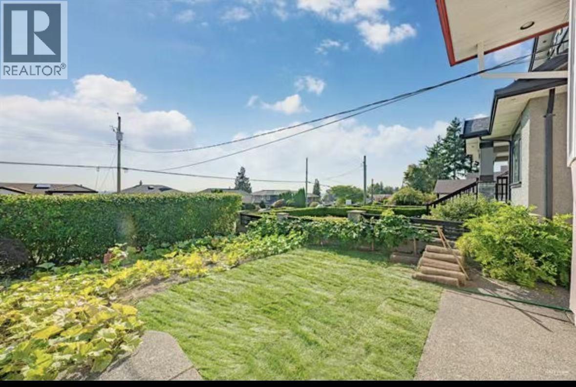 A well-maintained garden with a clear sky above.