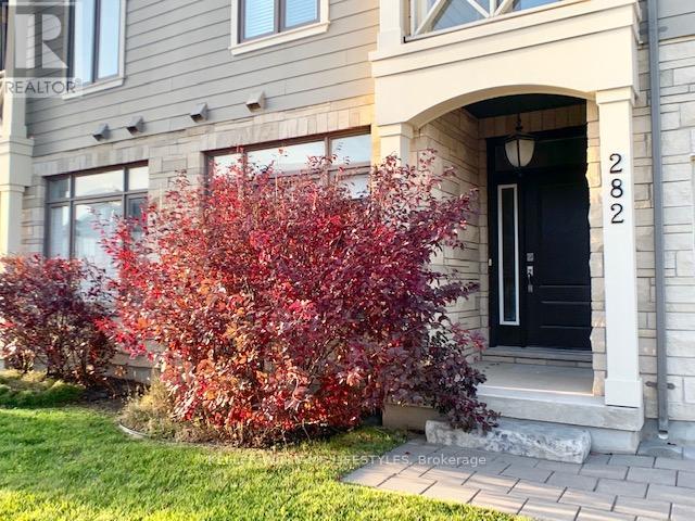 A house with the number 282 on the front door.