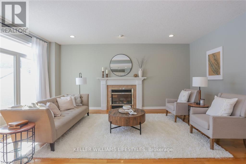 A living room with a fireplace and a couch.