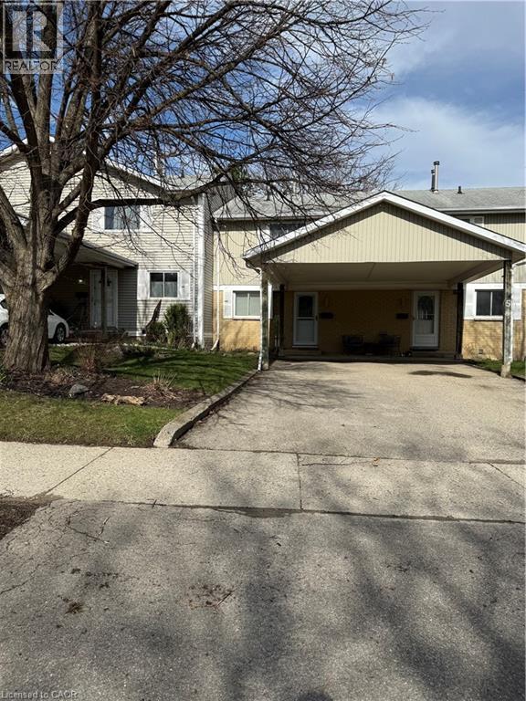 A house with a garage and a driveway.