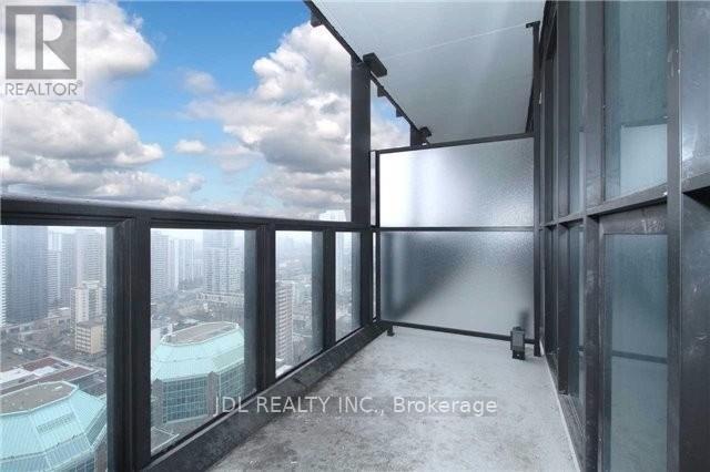 A brokerage office with a view of the cityscape.