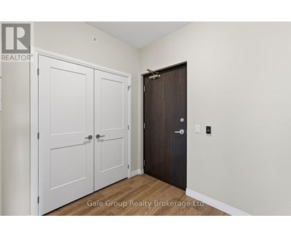 A room with a white door and a brown door.