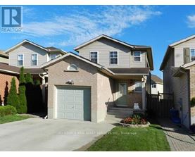 A house with a garage is for sale.