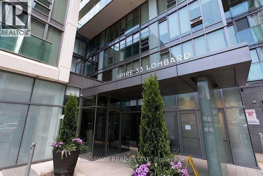 The front of a building with the words "Spire 33 Lombard" on it.
