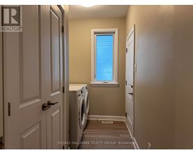 A laundry room with a washer and dryer.