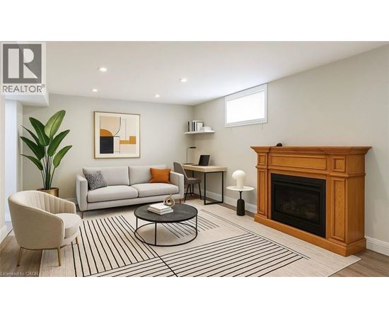 A living room with a fireplace and a couch.
