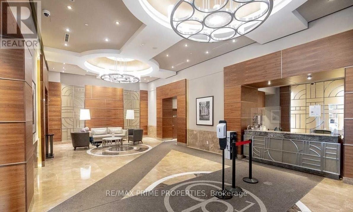 A reception area with a desk and a chair.