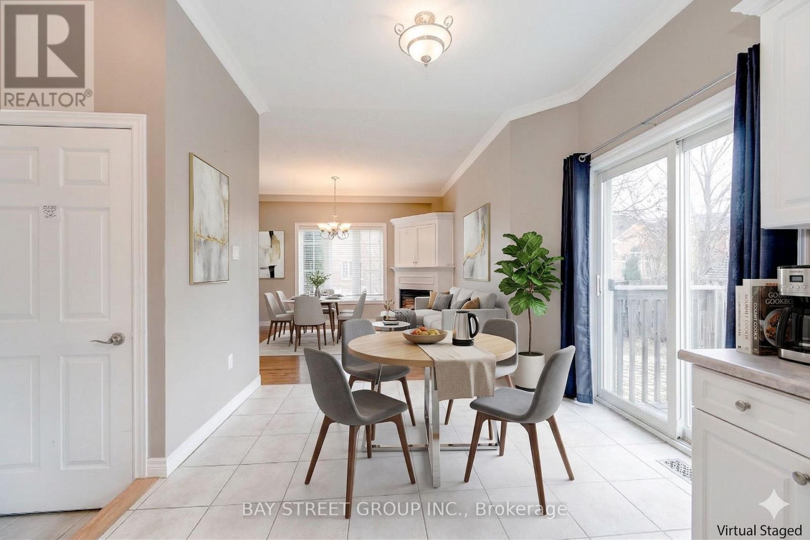 A virtual staged dining room with a table set for six.