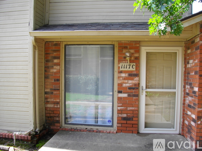 A house with a number 1117 on the door.