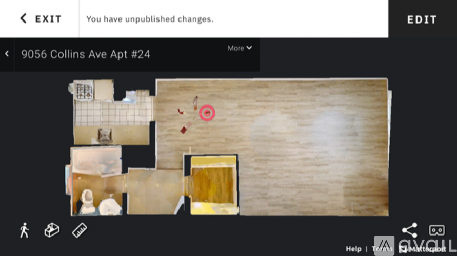 A digital image of a room layout with a door and a red circle on the floor.