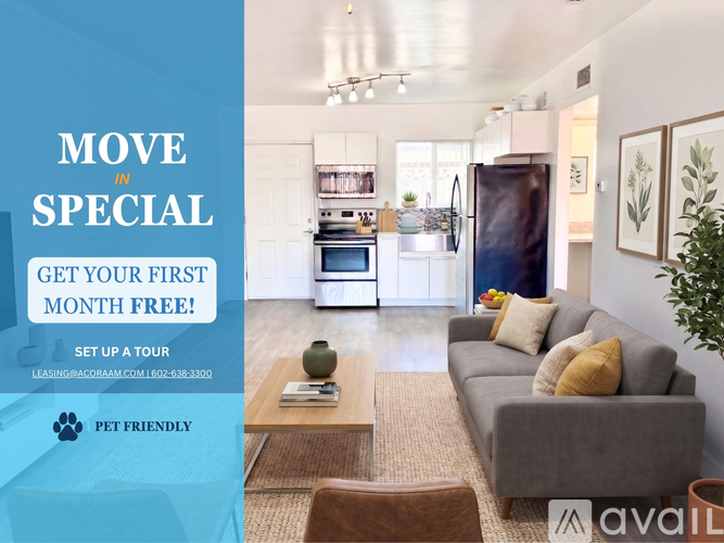 A modern living room with a kitchen in the background and a sign offering a free first month of rent.