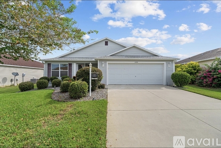 A house with a garage is available for sale.