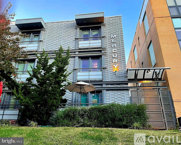 A modern building with the word "Mercury" on the side.